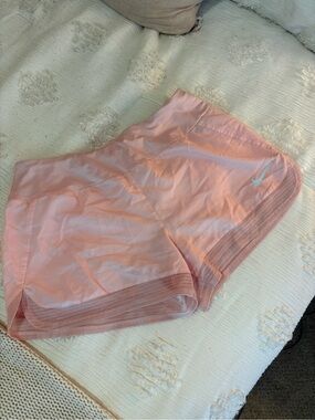 Nike Women’s Light Pink Athletic Shorts with Mesh Trim